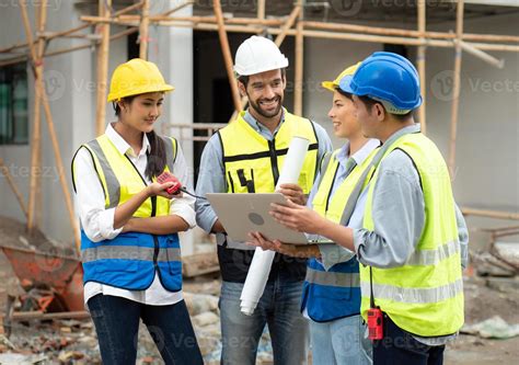 Female Construction Engineer Holds Computer Laptop Meeting With