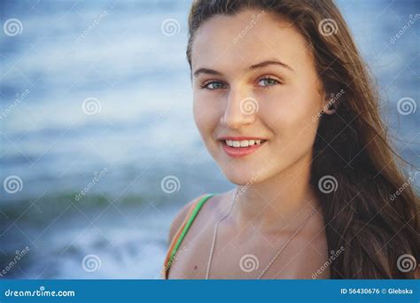 Portrait Of Young Beautiful Girl On Beach At Sunset Stock Photo Image