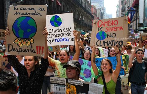 Cambia el sistema no el clima Miles de jóvenes en las calles contra