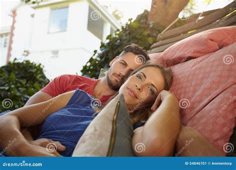 Romantic Couple In Garden Hammock Together Stock Image Image Of Lying