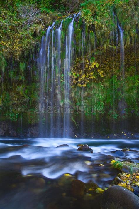 Vertical Long Exposure Shot Of The Mossbrae Falls In Dunsmuir Stock