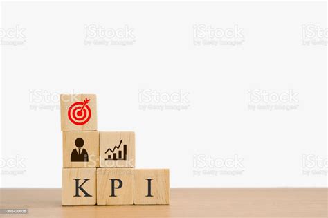 Wooden Cubes Business Icon On Kpi Word On Wood Desk For Key Performance