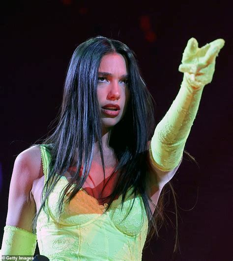 Dua Lipa Dazzles On Stage In A Stunning Neon Yellow Catsuit During Her