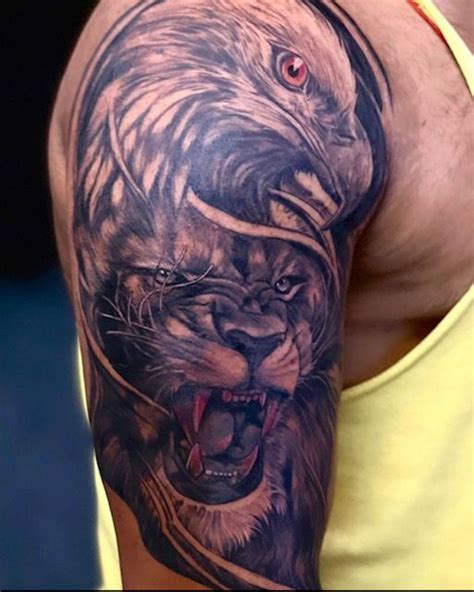 Lion and Eagle Tattoo | Band tattoo designs, Tattoos, Tattoo work