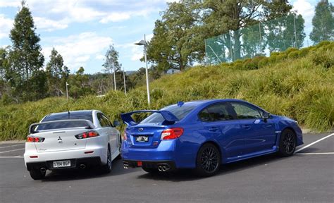 Review Mitsubishi Lancer Evo Vs Subaru Impreza Wrx Sem Mais