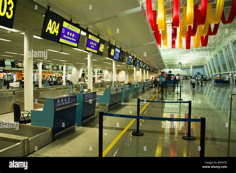 Check in desks at Wuhan Airport, China Stock Photo - Alamy