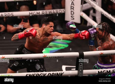 LAS VEGAS, NEVADA -April 22: (L-R) Ryan Garcia punches Gervonta Davis ...