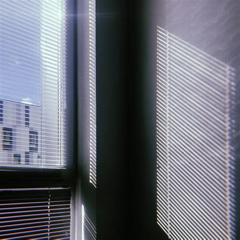 White window blinds on window photo – Free Иннополис Image on Unsplash
