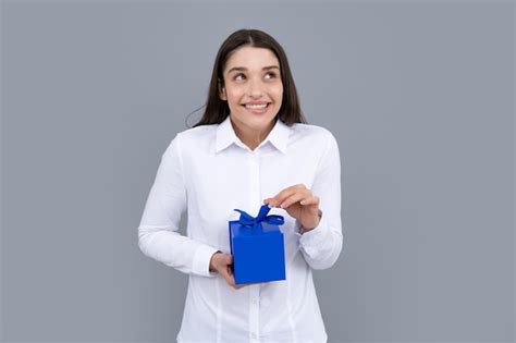 Premium Photo | Woman with gift portrait of excited young girl holding gift box isolated grey ...