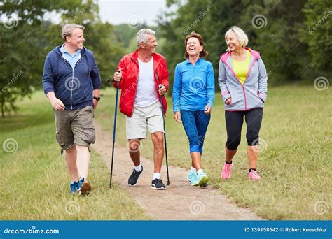 Active Group Of Seniors Walking Stock Photo Image Of Active