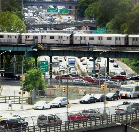 A No. 4 train runs across the Cross Bronx Expressway. Photo taken in ...