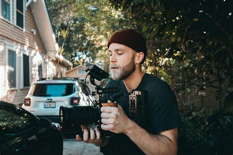 man holding video camera  stock photo