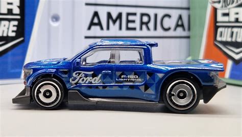 Машинка Базова Hot Wheels Ford F Lightning Custom Hot Trucks HKG Blue купити в