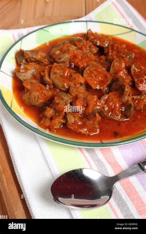 Chicken gizzard stew Stock Photo - Alamy