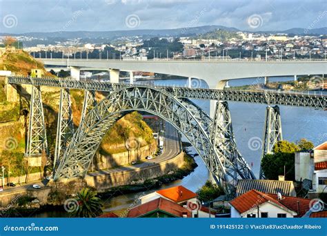 Old And New Railway Bridges Over Douro River In Oporto Stock Photo