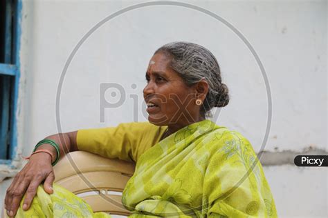 Image Of Indian Old Woman Of A Rural Village Speaking With Expressions