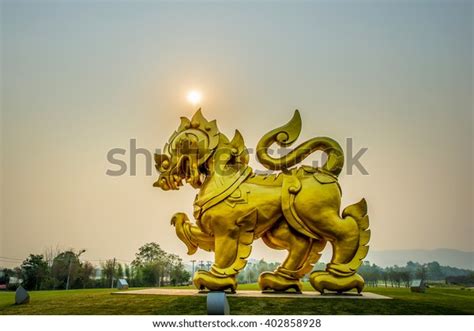 Gold Singha Statue On Sunset Background Stock Photo 402858928