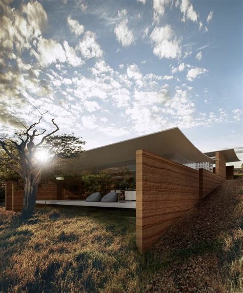 Modern Rammed Earth House In Field