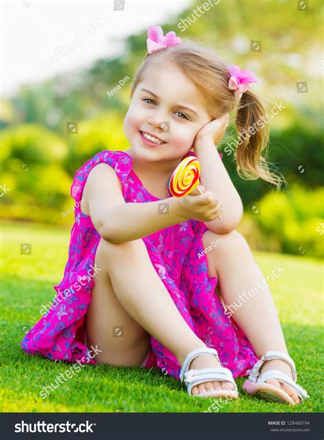 Photo Cute Little Girl Sitting On Foto Stock 128460194 Shutterstock