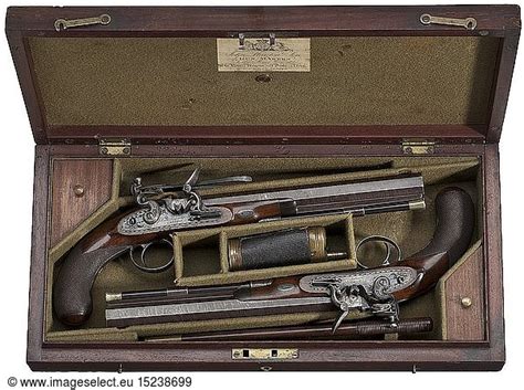 A Cased Pair Of Flintlock Pistols A Cased Pair Of Flintlock Pistols