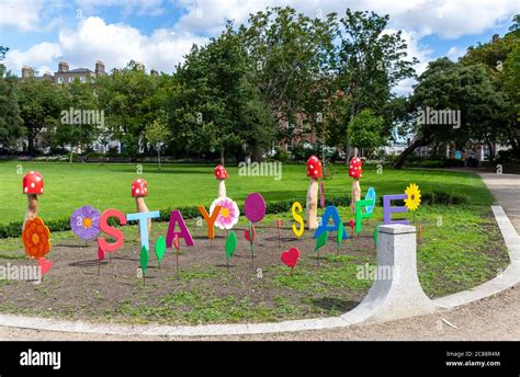 Colorful Signage Artwork In Public Park Letters Text Reading Stay