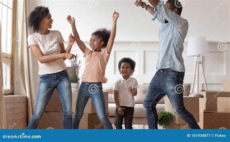 Smiling Family with Kids Dance Happy To Move Stock Image - Image of ...