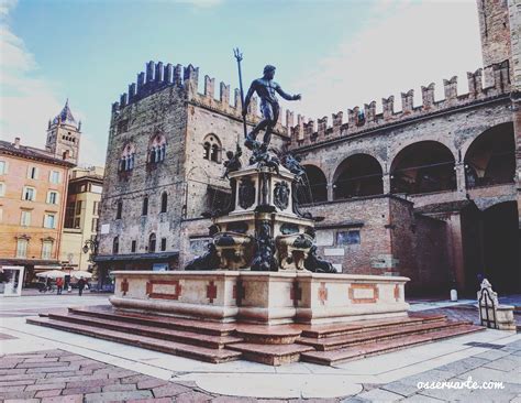 A Statue Is In The Middle Of A Courtyard