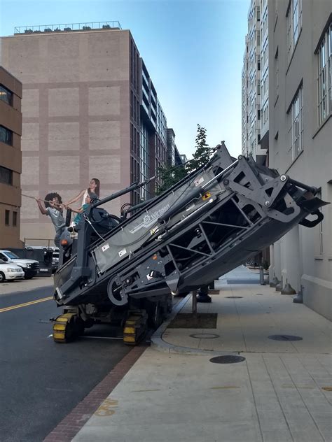Confusing perspective in NoMa. Also, how is it legal to hang hydraulics