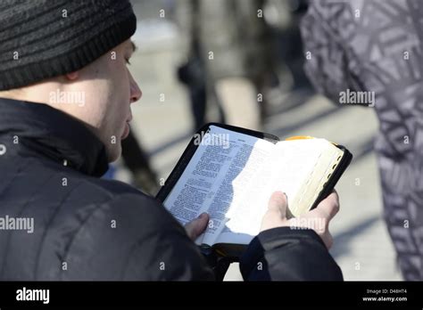 Christian Activist Reading Bible Aloud On Picket To Free Pussy Riot Members On March