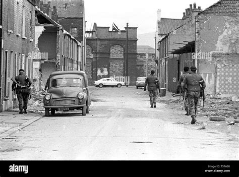 British Army Patrolling Deserted Part Of Belfast Early 70s Northern