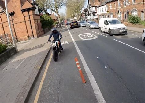 Near Miss of the Day 863: Motorcyclist zooms into cycle lane from the