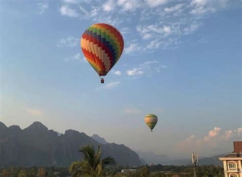 Hot Air Balloon In Vang Vieng Soaring Into The Skies