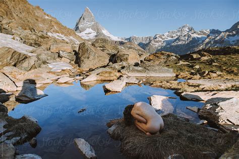 From Above Of Vulnerable Naked Woman Lying Alone By Stocksy Contributor Alina Miluseva Stocksy