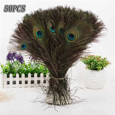 Wholesale 50pcs 25 30cm Natural Peacock Tail Feathers beautiful natural ...