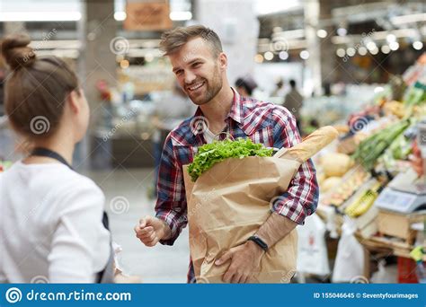 Man Talking To Shop Assistant Stock Image Image Of Farmers