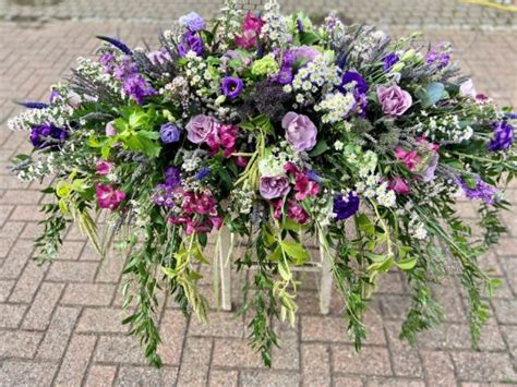 Purple And Lilac Casket Spray Welwyn Florist