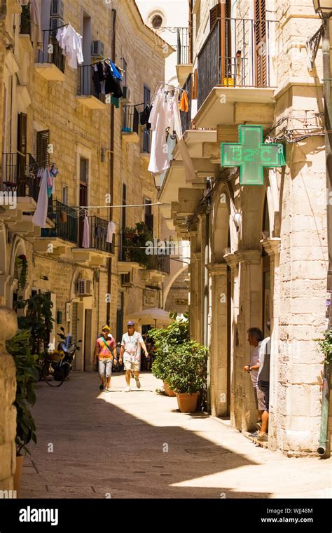 BARI, ITALY - JULY 11, 2018, View of a narrow street in Bari, Puglia ...