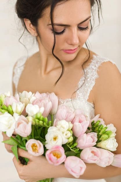 Premium Photo Close Up Of Bride Holding Bouquet