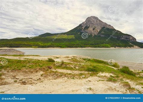 Mount Baldy From The Shore Of Barrier Lake Kananaskis Alberta Stock