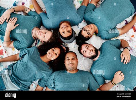 Taking A Break High Angle Portrait Of A Diverse Group Of Friends Lying