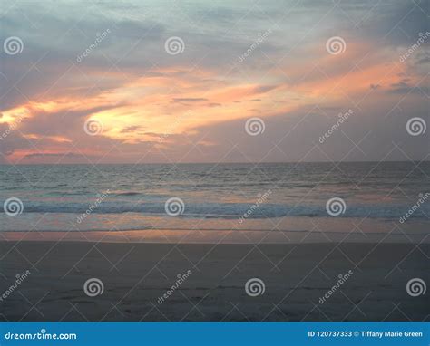 The Sunrise Over Cocoa Beach On A Cloudy Day Stock Image Image Of