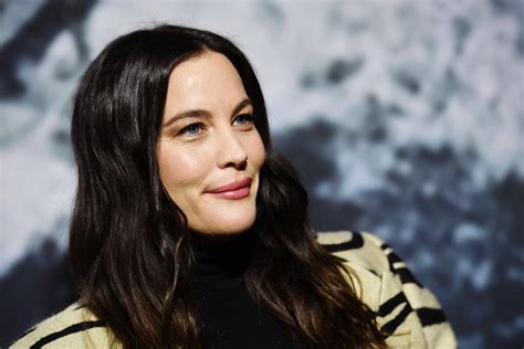 Liv Tyler Goes Wild In Tiger Print Coat For Stella Mccartney X Adidas