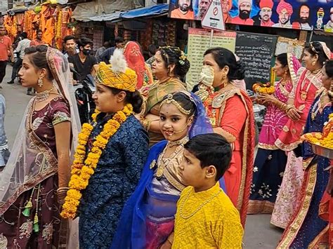 Decorated Idols Of Lord Shiva And Mother Parvati A Procession Was