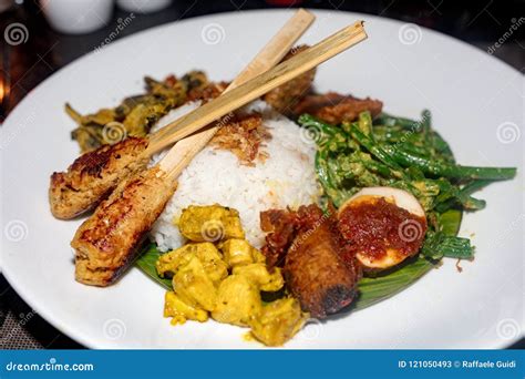 Nasi campur balinese dish stock image. Image of southeast - 121050493