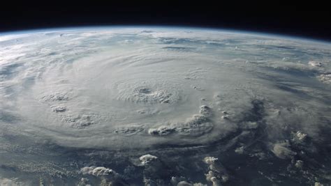 Satellite View Of A Large Hurricane Typhoon With A Well Defined Eye