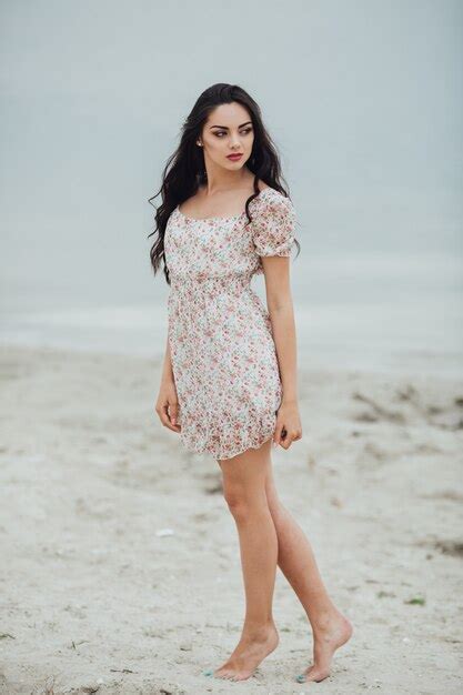 Premium Photo Brunette Woman Wearing A Floral Dress