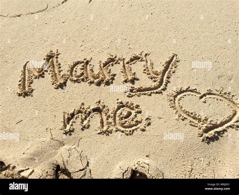 Marry me sign at beach, sign in sand, proposal of marriage at the beach ...