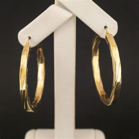 9ct Yellow Gold 48mm Flat Twist Hoop Earrings 46g Jewellery From Almagrove Jewellers Uk