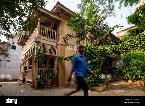 An heritage wooden house in an old district of Mumbai with an ...