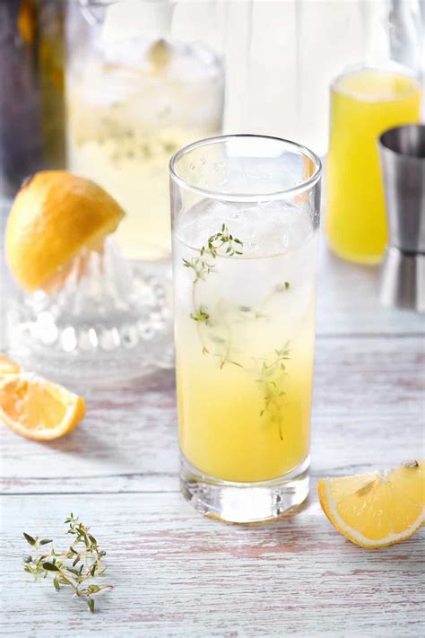 Boozy Mango Lemonade Cocktail Recipe Bourbon And Boots